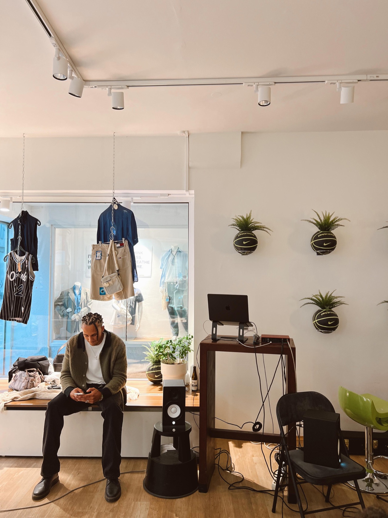 SELAH seated next to his performance setup during a pop-up session